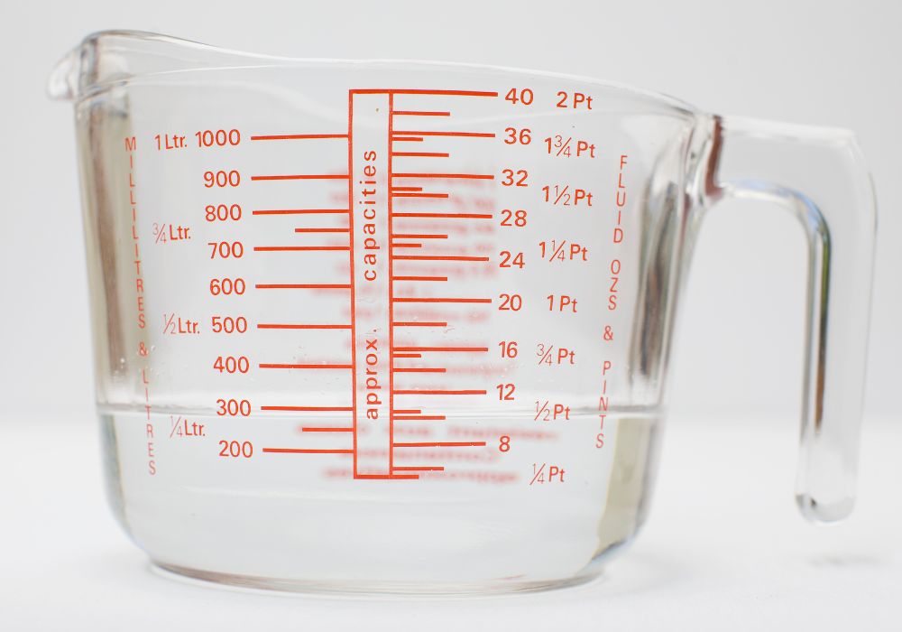 liquid measurements in a measuring jug showing markings